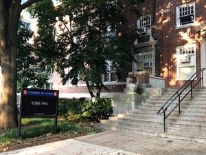 Coble Hall. UIUC signage and Wright Street entrance.